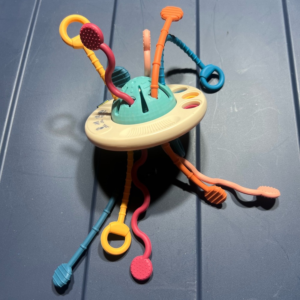 Teal and Cream Sensory Learning Toy